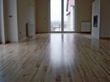 Realizacja podłogi drewnianej w mieszkaniu prywatnym. Zdjęcie nr: 2